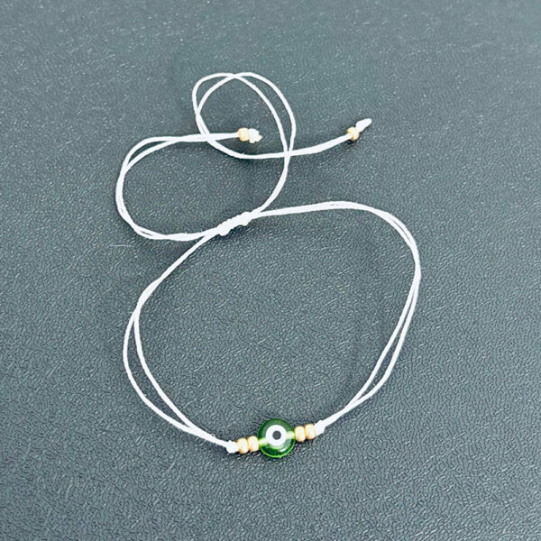 White Thread Bracelet with Jade Eye: Stone of Harmony