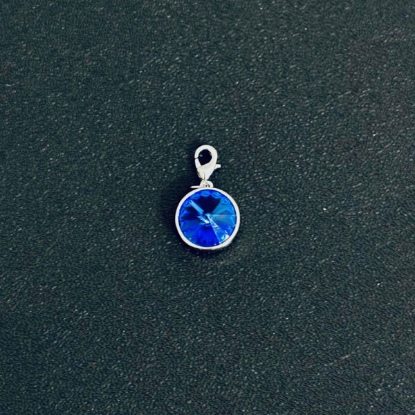 True Essence: Silver Circle Charm with Blue Spinel